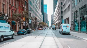 delivery trucks on road