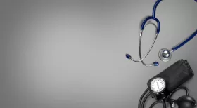 stethoscope and blood pressure monitor used to symbolize occupational disease