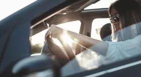 woman driving well maintained car