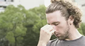 Frustrated person after New York workers comp claim is denied