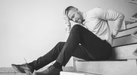 man on stairs after fall accident at work