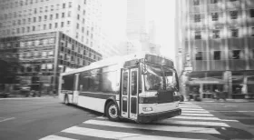 New York City bus turning on a city street