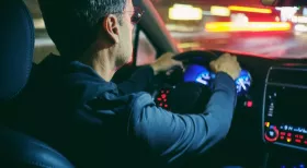 Man driving at night