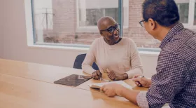 Client discussing case with personal injury lawyer