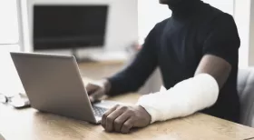 Man researching what to do after a work injury in New York