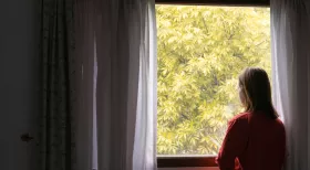 injured woman with scars and disfigurement contemplates filing an injury claim