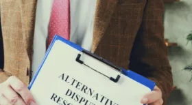 alternative dispute resolution on clipboard