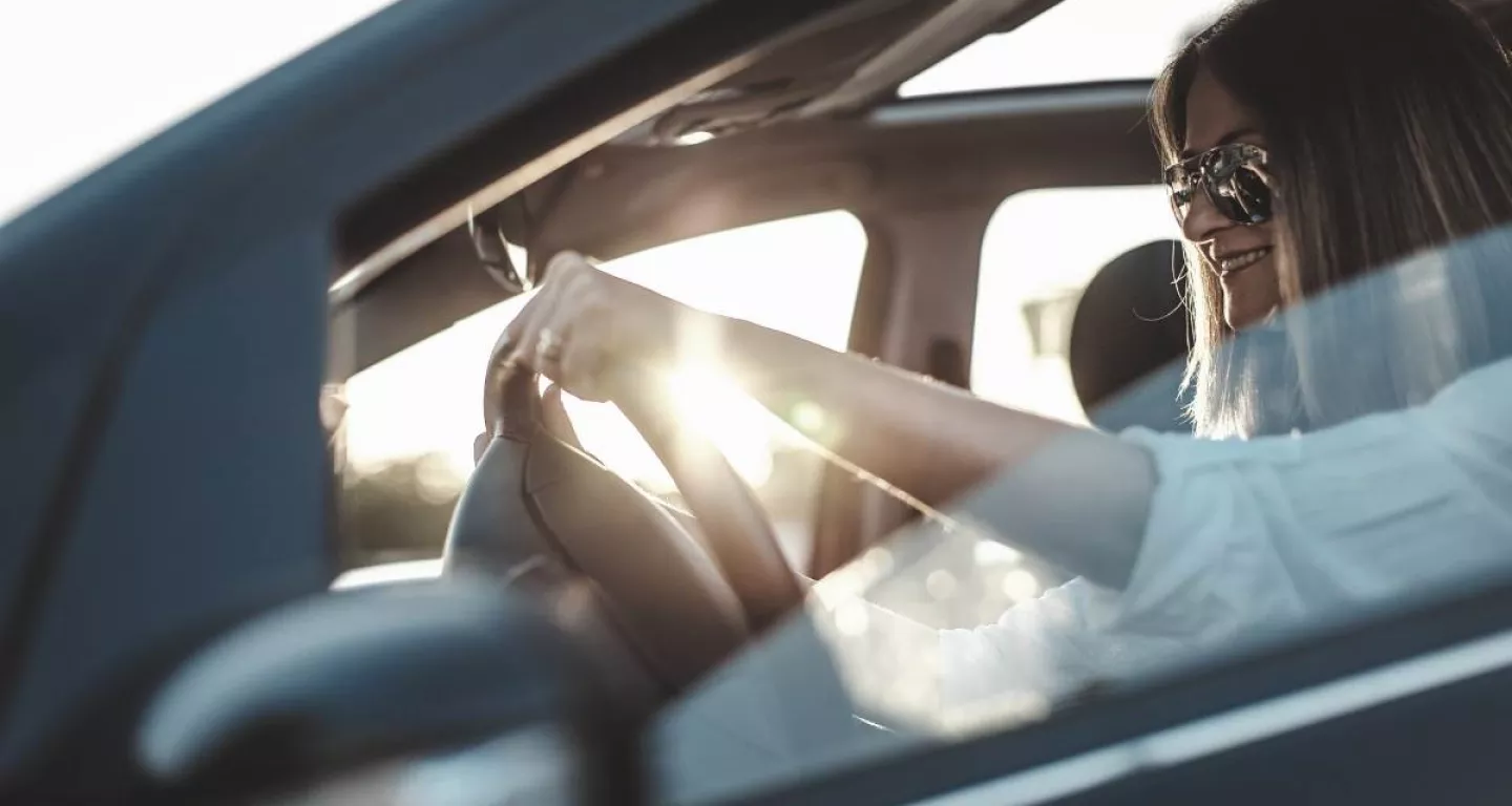 woman driving well maintained car