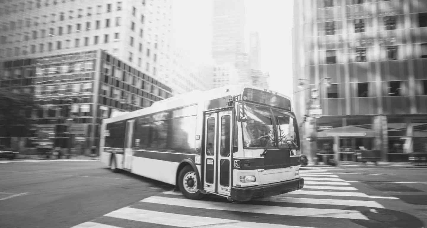 New York City bus turning on a city street
