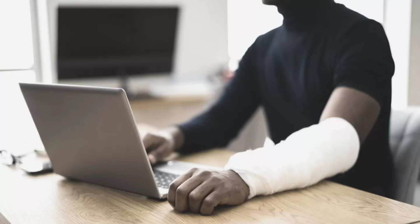 Man researching what to do after a work injury in New York