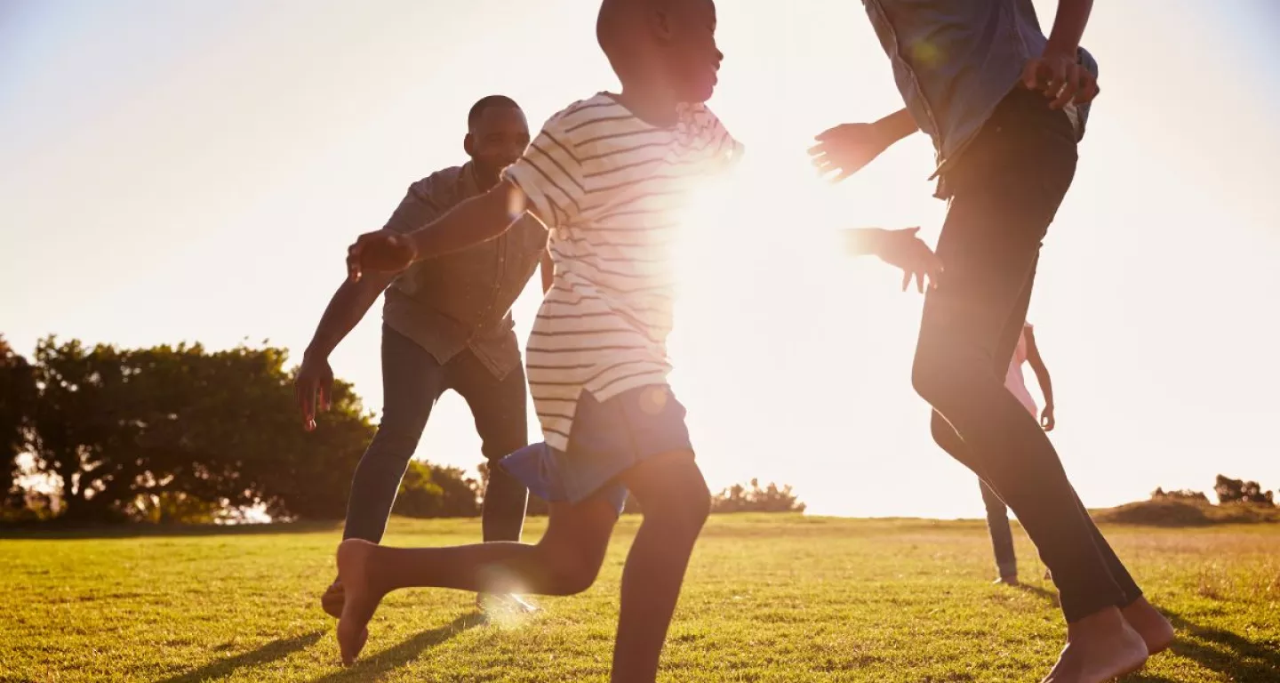 kids playing in the summer on a field